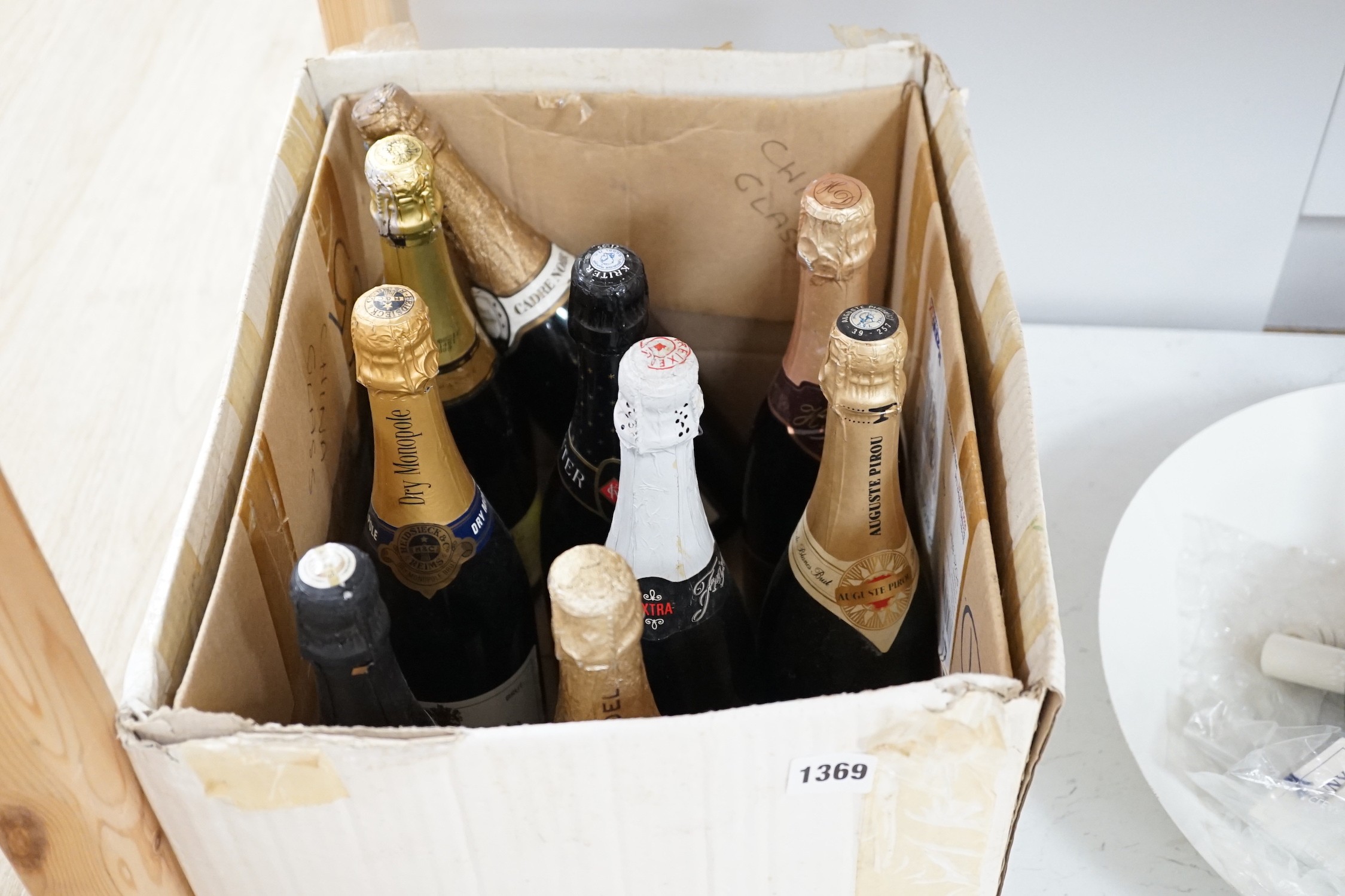 Nine various bottles of champagne, cava and sparkling wine